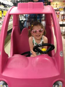 silly girl in shopping cart