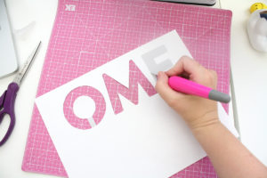 Cutting out letters for doormat stencil