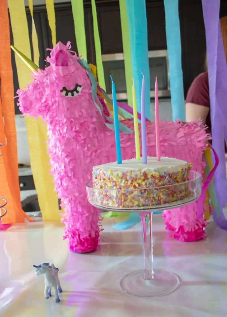 unicorn piñata and birthday cake