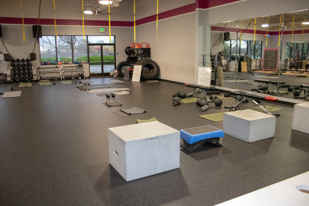 Shot of the gym floor at Kaia Fit. They offer a varied workout routine every day.