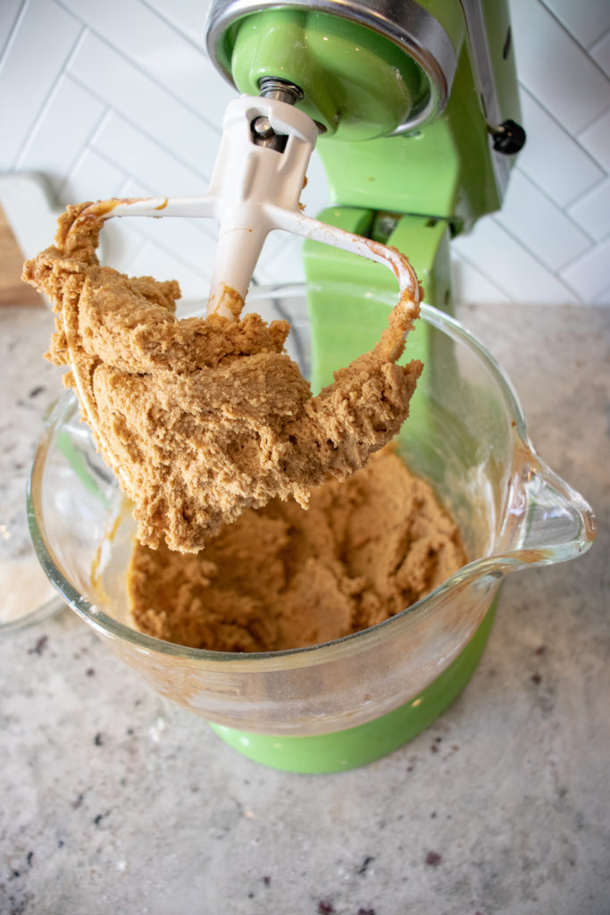 molasses cookie dough hanging off the mixer beater