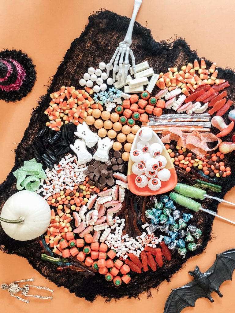 Halloween candy arranged on table