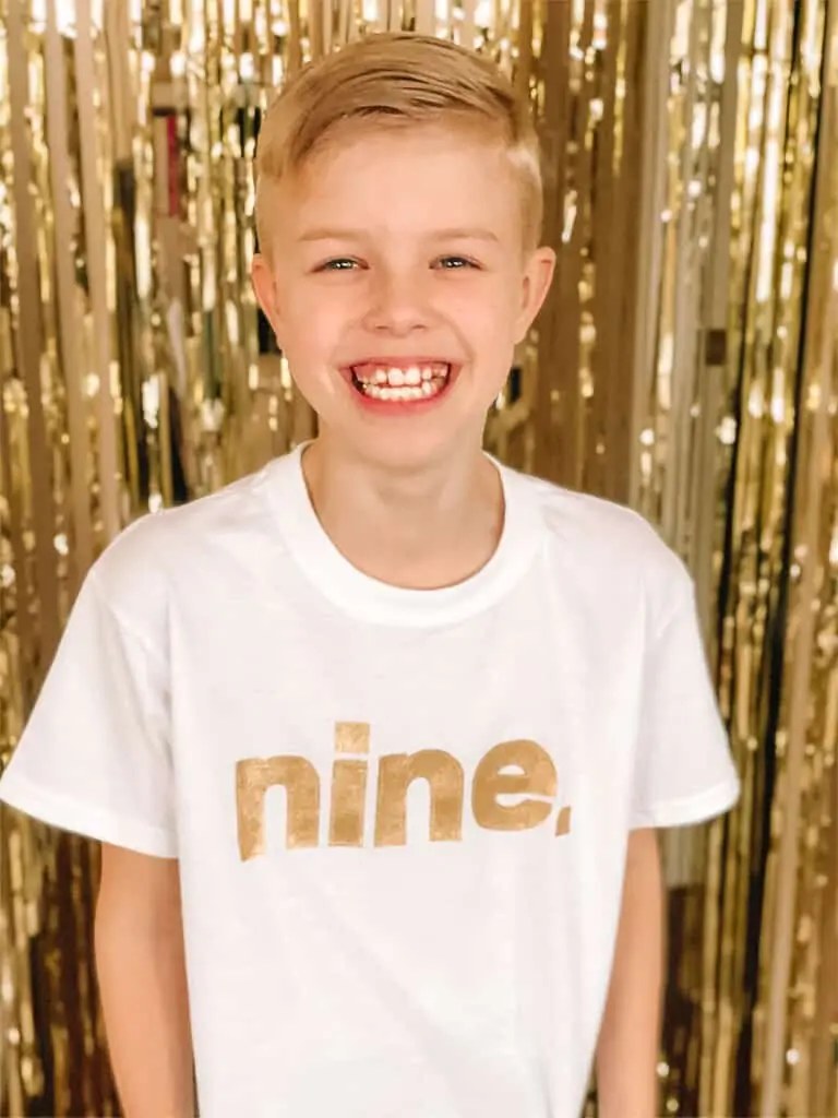 9 year old in NINE shirt