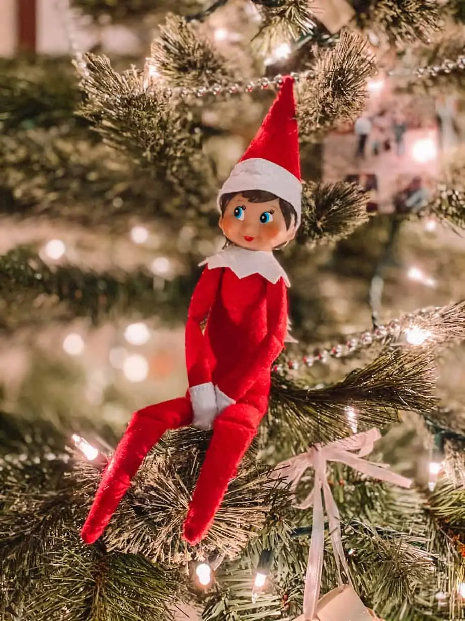 elf on the shelf on a christmas tree